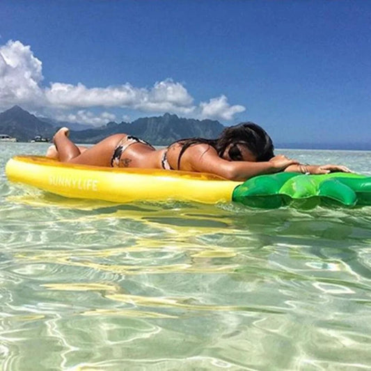 Mandotos Pineapple Paradise pool float with a colorful tropical pineapple design, perfect for summer pool days.