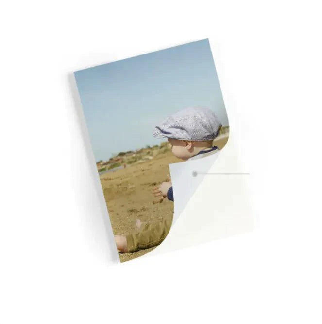 Mandotos portable Bluetooth photo printer for on-the-go printing, compact device with paper tray and control buttons.