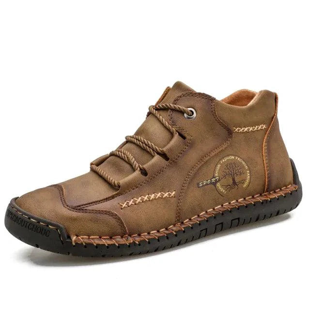 Mandotos premium microfiber leather boots showing sleek design, ankle height, and smooth leather finish.