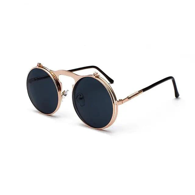 Retro flip steampunk sunglasses by MANDOTOS featuring metallic frames and vintage-inspired design with tinted lenses.