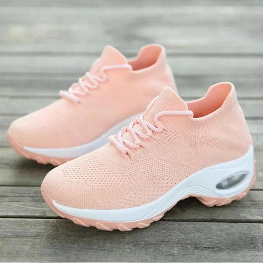 Mandotos women's sports shoes with flying knit sock design, lightweight and flexible for active wear.
