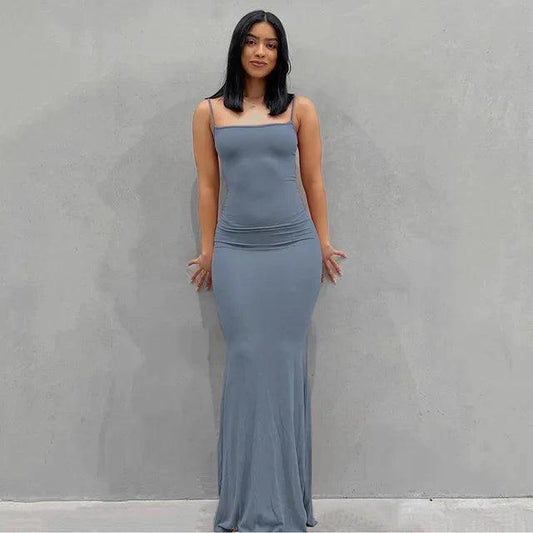 Elegant satin backless gown by MANDOTOS featuring a sleek design, smooth fabric, and a flattering fit for formal occasions.