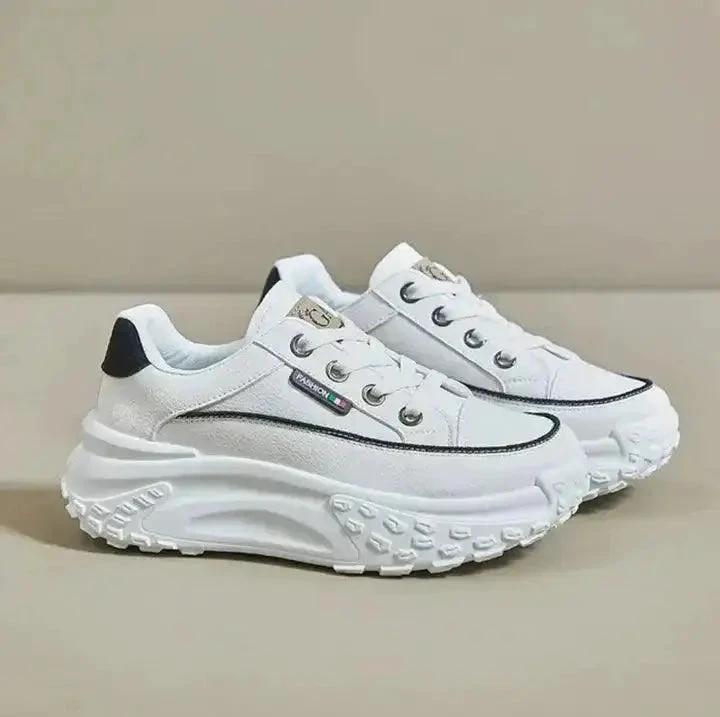 Mandotos stylish orthopedic shoes with supportive design and comfortable fit, featuring neutral tones and textured sole.