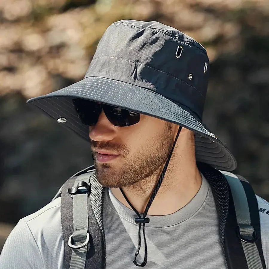 Mandotos sun-safe stylish bucket hat with wide brim and breathable fabric for outdoor sun protection.