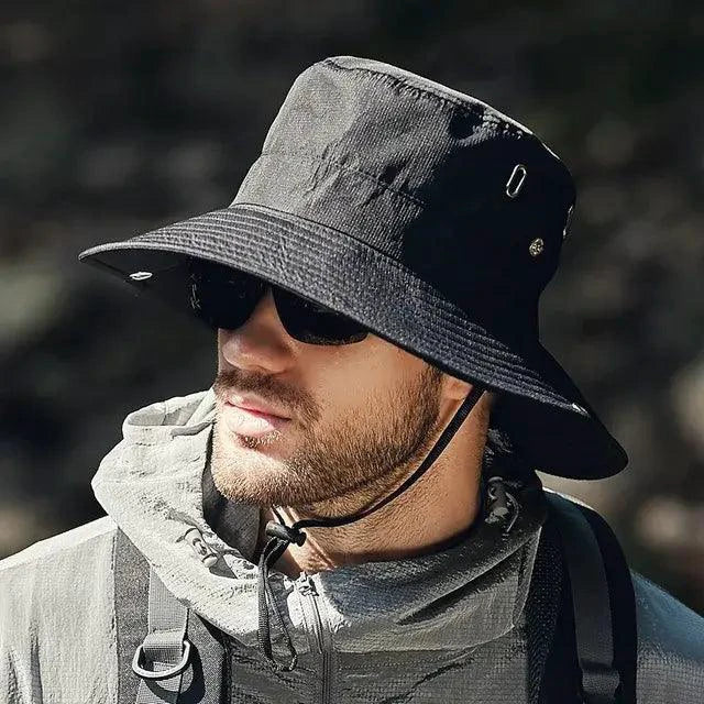 Mandotos sun-safe stylish bucket hat with wide brim, lightweight fabric, and adjustable chin strap for outdoor sun protection.