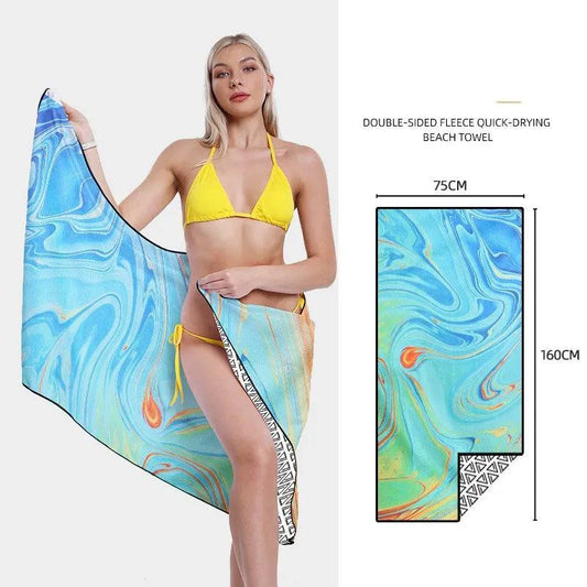 Mandotos SwiftDry patterned beach towel featuring vibrant geometric designs, soft fabric, perfect for seaside relaxation.