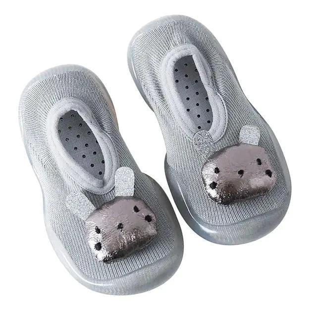 Mandotos toddler shoes in soft fabric with velcro straps, designed for comfort and easy wear for young children.