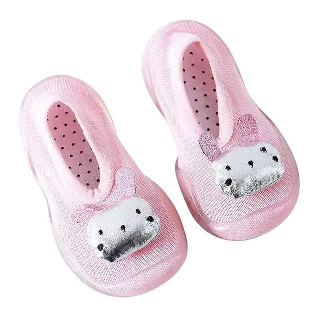 Mandotos toddler shoes in soft fabric with Velcro straps, designed for comfort and easy wear for young children.