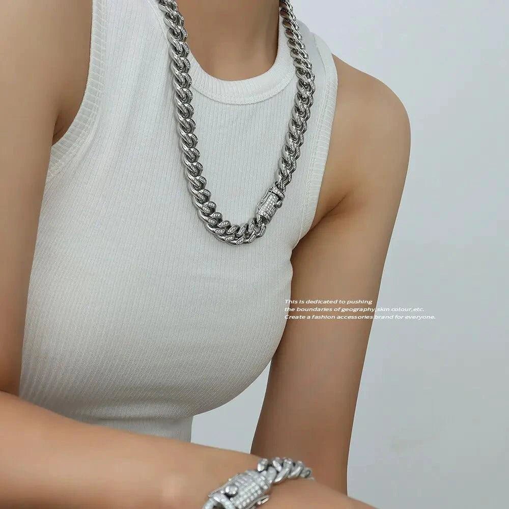 Mandotos TOSOKO 18K gold plated Cuban chain set with sparkling zircon stones, featuring a bold, stylish jewelry design
