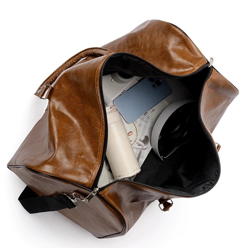 Mandotos travel bag for men and women, made of PU leather, with large capacity, shoulder strap, and stylish duffle design.