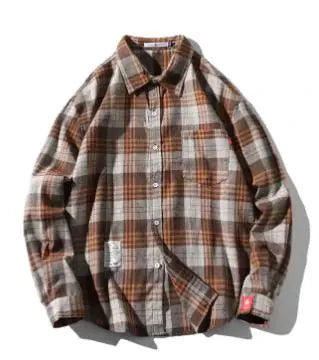 Unisex checkered long sleeve shirt by MANDOTOS featuring a classic black and white pattern and button-up front.