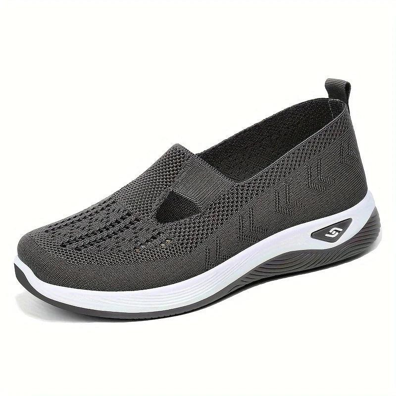 Women's airy mesh sneakers by MANDOTOS featuring breathable fabric, lightweight design, and casual athletic style.