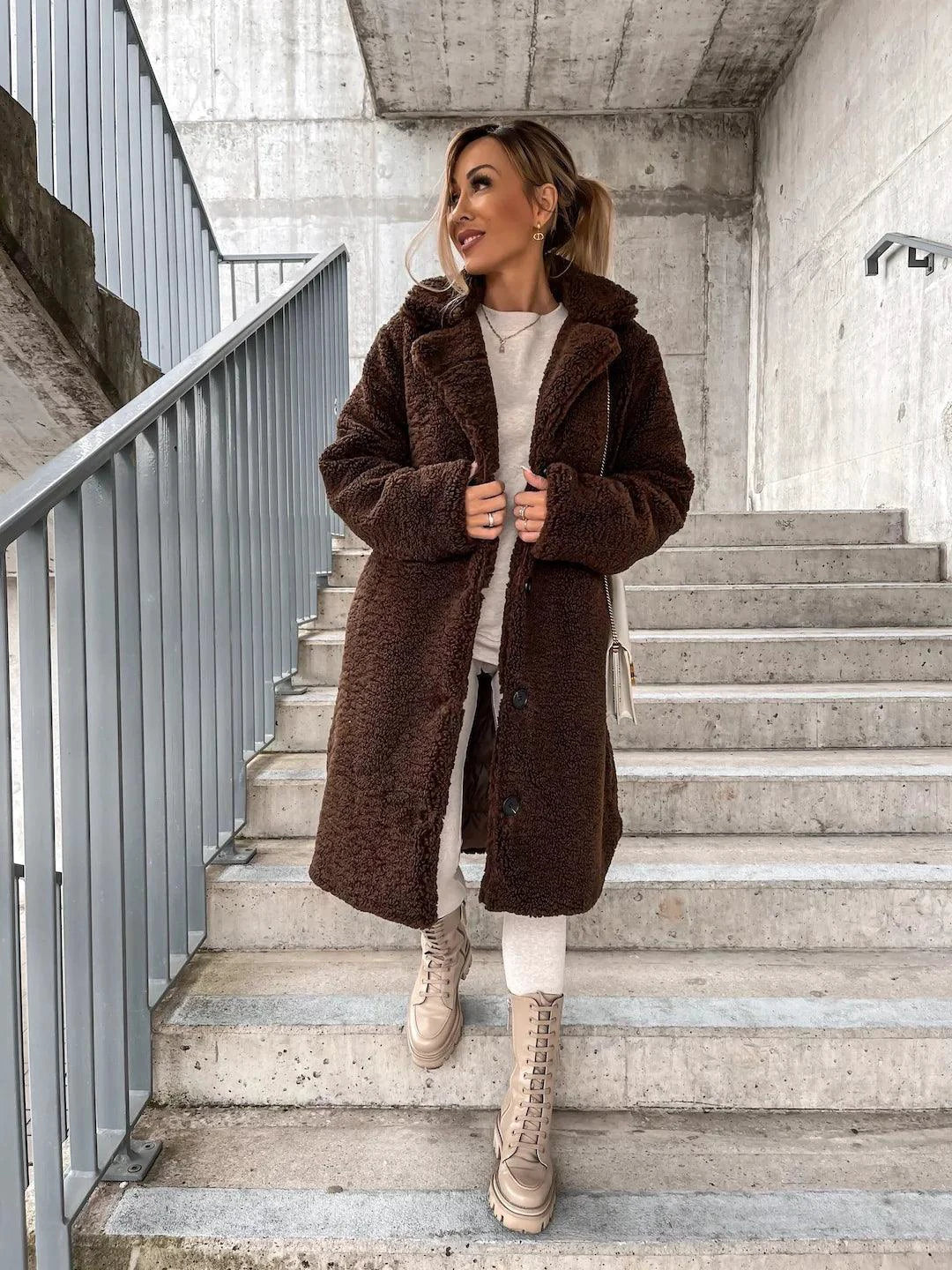 Women's lamb wool coat by MANDOTOS featuring a cozy, stylish design in soft wool fabric, perfect for cold weather.