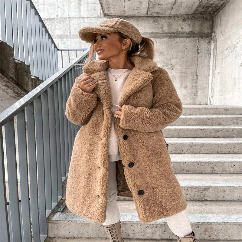 Women's lamb wool coat by MANDOTOS, featuring a stylish tailored design and cozy wool fabric, perfect for cold weather.