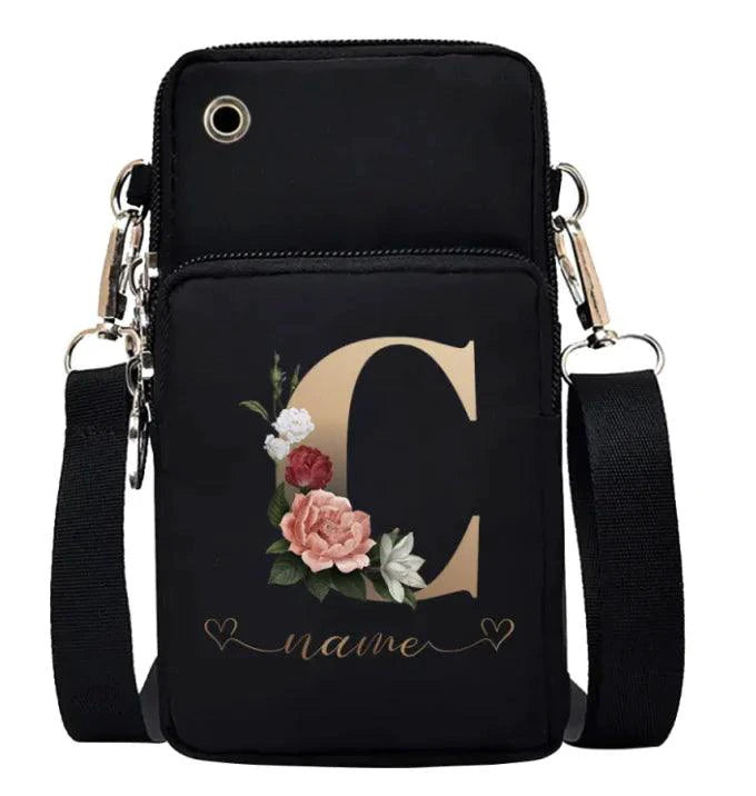 Women's genuine leather handbag by MANDOTOS, showcasing a portable stylish design with top handles and sleek finish.