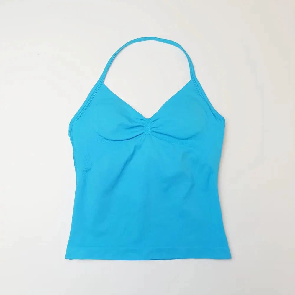 NCLAGEN Impact longline strappy women's yoga vest with open back design, ideal for fitness, running, and workout activities.