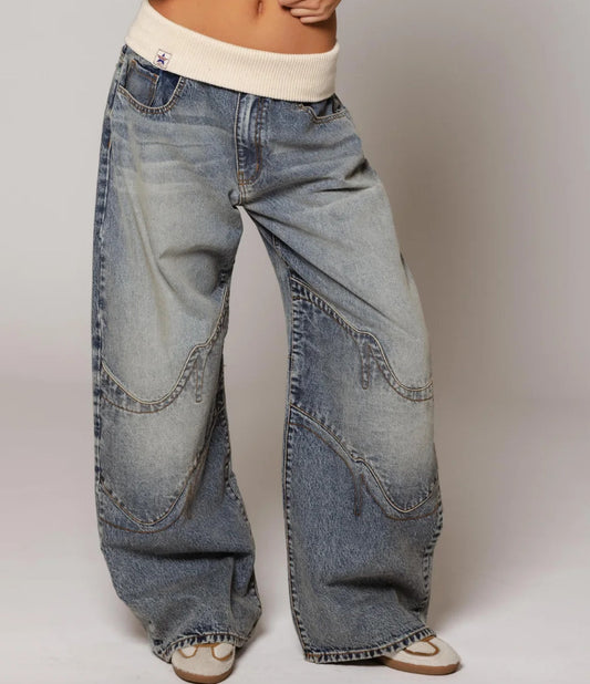 Women’s loose-fitting straight-leg jeans by Ancient Energy with pockets, casual street-style trousers in denim fabric.