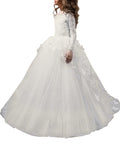 Elegant white flower girl dress with lace sleeves and tulle skirt, perfect for weddings and special occasions.