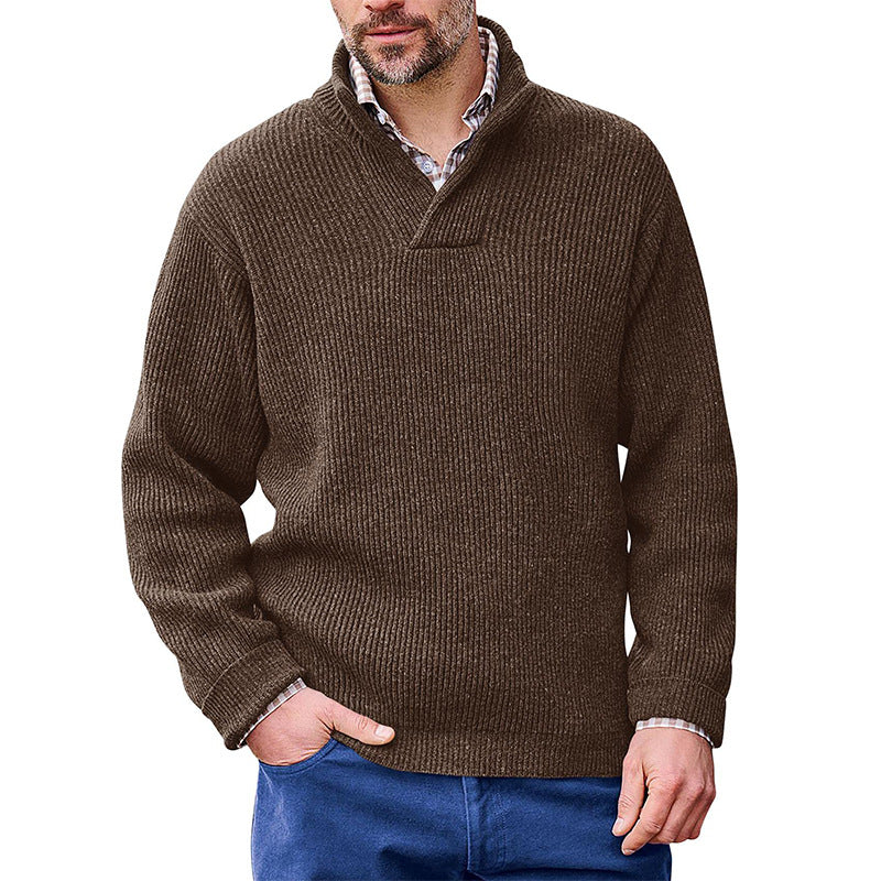 Man wearing a brown high neck classic sweater by Mandotos International over a collared shirt.