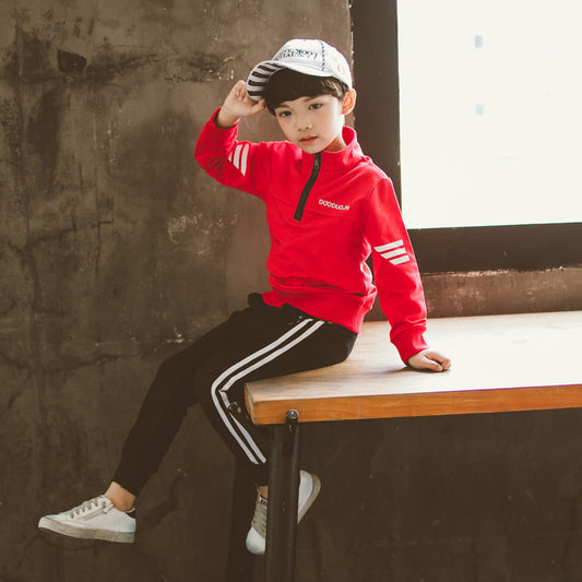 Boy in red half-zip sweatshirt & black stripe joggers, kids sportswear set
