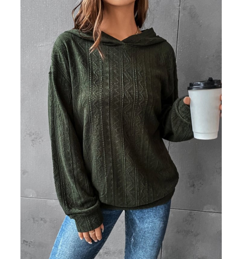Woman wearing a dark green textured Autumn casual solid hoodie by Mandotos International