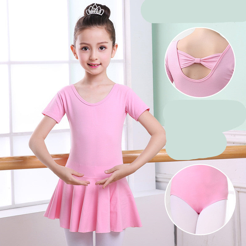 Pink ballet leotard with skirt for girls, featuring bow back detail and white tights, perfect for dance class