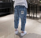 Ancient Energy big kids loose harem trousers with fleece padding, overalls style, comfortable and warm for active wear.