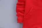 Children's three-piece clothing set from Ancient Energy, featuring colorful tops and pants, suitable for kids' casual wear.