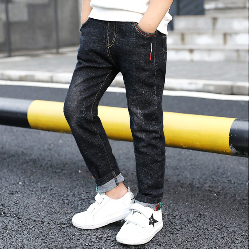 Boy's denim trousers by Ancient Energy, stylish big children's jeans for spring and autumn, featuring a modern design.