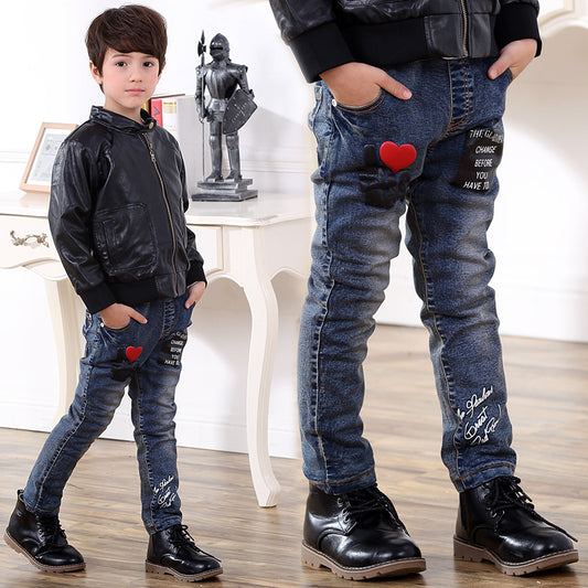 Child boy jeans from Ancient Energy, showing blue denim fabric and classic five-pocket design.