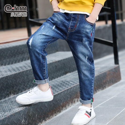 Boys' denim trousers by Ancient Energy, new style big children's pants for spring and autumn, shown on a child.