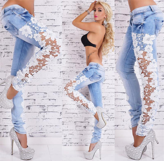 Light blue lace jeans from Ancient Energy with intricate lace detailing and slim fit design.