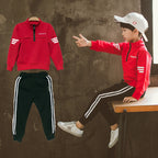 Young boy wearing Ancient Energy spring sports garment, casual leisure kids' school clothing in bright spring colors.