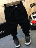 Boy's thickening velvet jeans by Ancient Energy featuring durable denim fabric and a comfortable fit for children.