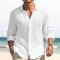 Man wearing a white plus size casual lapel shirt on a beach.