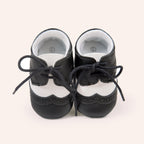 Ancient Energy men's baby shoes with soft soles, ideal for walking and early stages of toddler development.