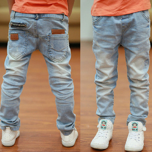 Young boy wearing Ancient Energy boys' spring and autumn pants, casual style, comfortable fit, outdoor setting
