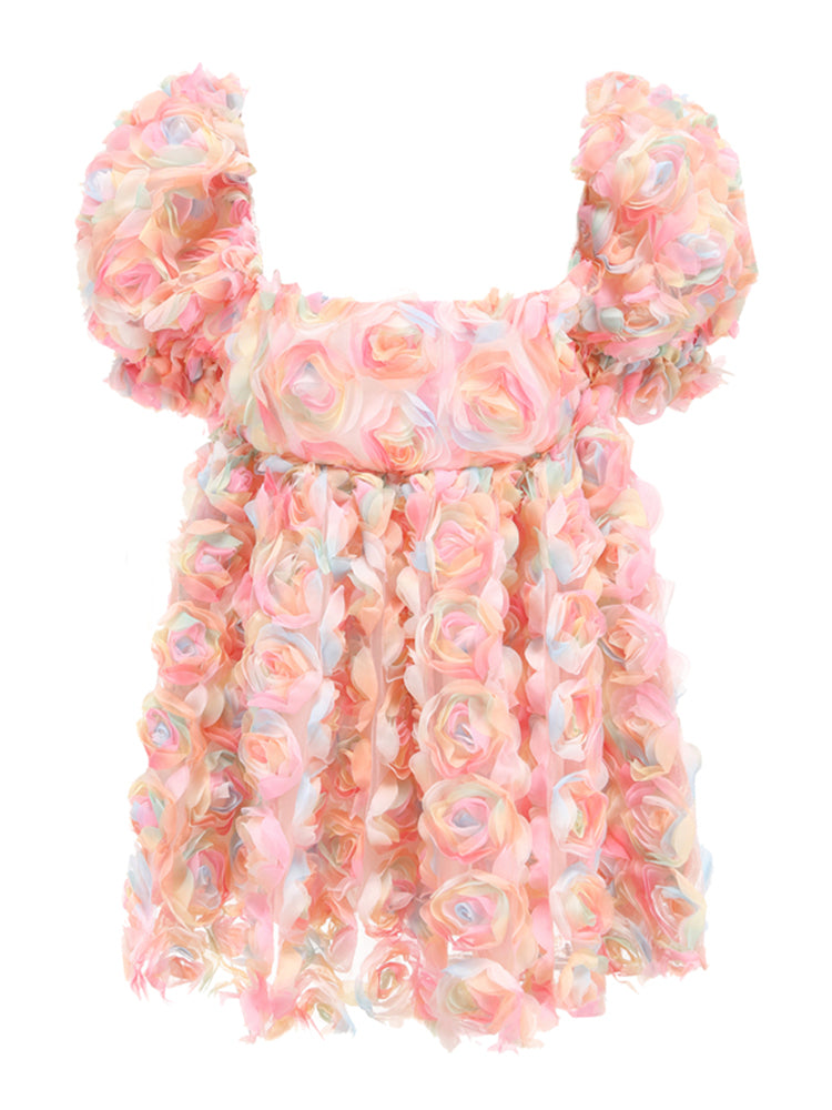 Ladies' blush floral puff sleeve mini dress by Mandotos International, featuring a feminine floral pattern and puffed sleeve design.