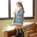 Colorful winter children's clothing set by Ancient Energy, featuring a cozy jacket, pants, and accessories for cold weather.