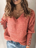 Mandotos International chic V-neck knit women's tee in coral pink with button sleeve details.