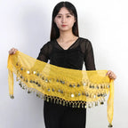 Woman holding a yellow belly dance hip scarf with gold coin tassels by Mandotos International