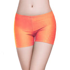 Orange belly dance safety shorts with diamond embellishments by Mandotos International