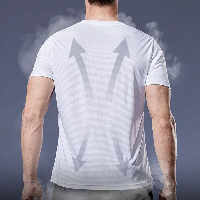 Back view of a man wearing a white quick-dry compression sport T-shirt with airflow graphics.