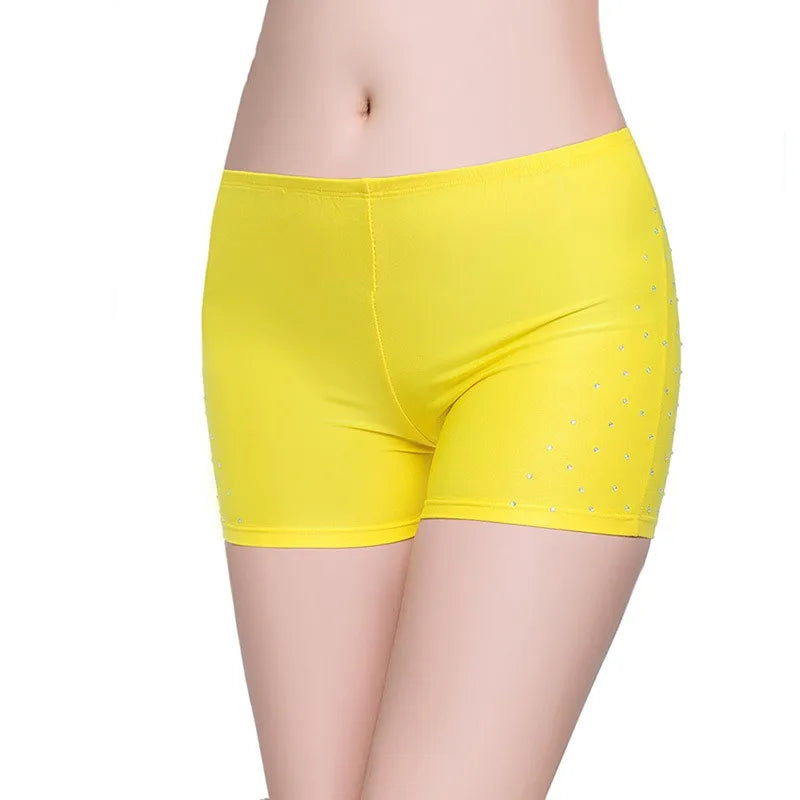 Yellow belly dance safety shorts with diamond embellishments by Mandotos International