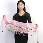 Woman holding a pink belly dance hip scarf with gold coin tassels by Mandotos International