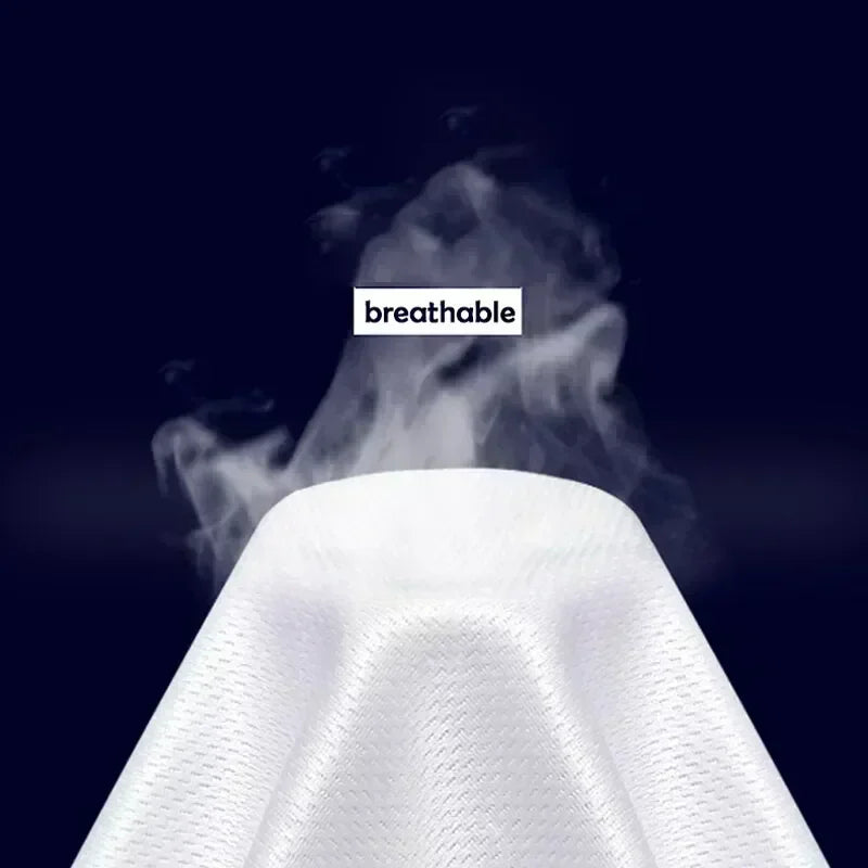 Close-up of breathable white textured fabric with steam rising against a dark background.