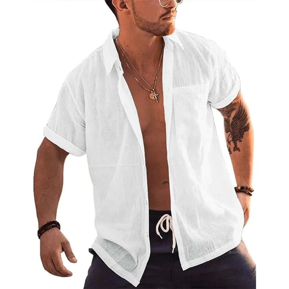 Man wearing a Mandotos International white short sleeve linen cotton beach shirt.