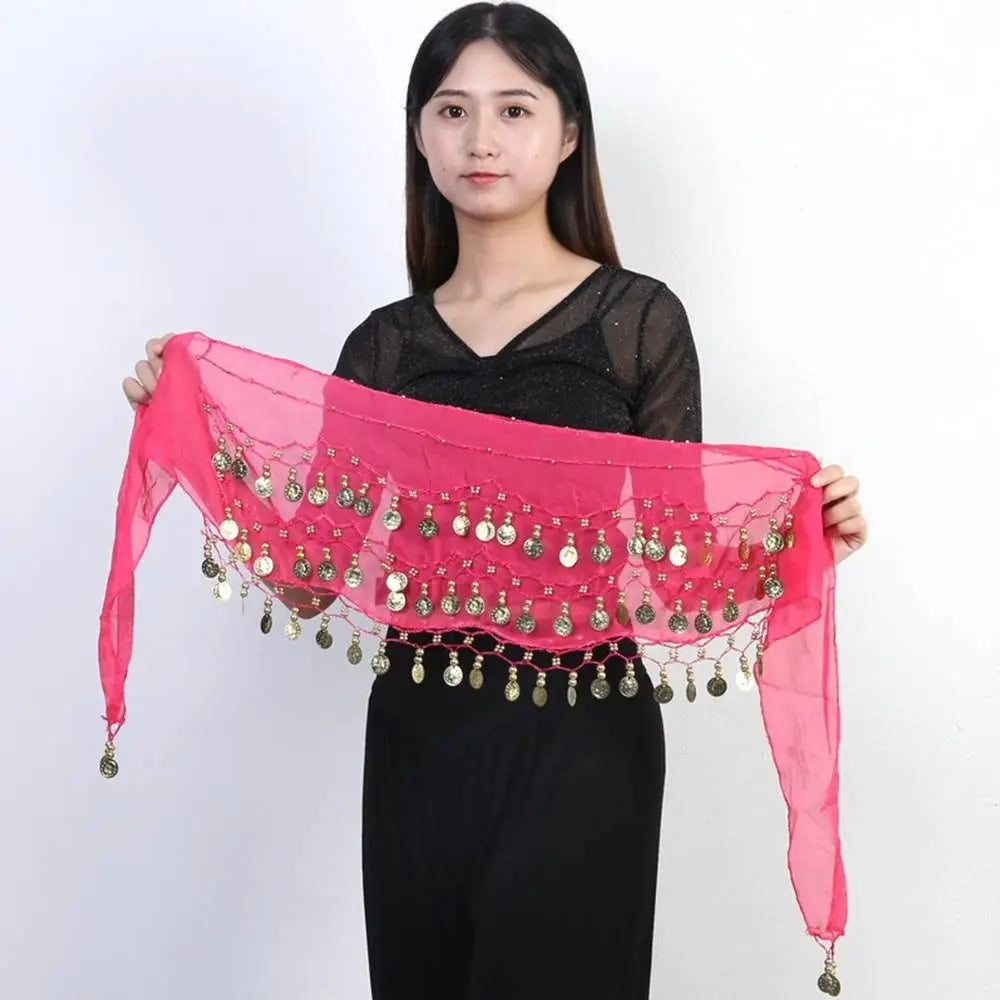Woman holding a pink belly dance hip scarf wrap with gold coin tassels