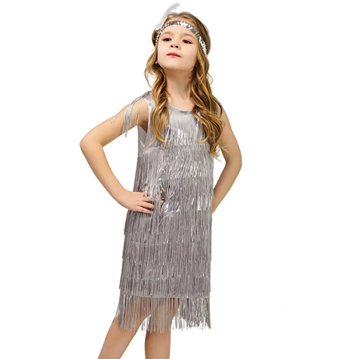 Girl in silver flapper dress with fringe and sequins for carnival or Latin dance