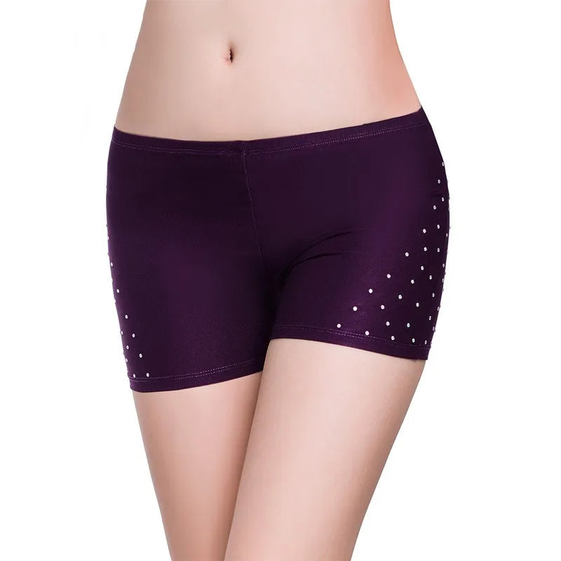 Purple belly dance safety shorts with diamond embellishments by Mandotos International